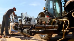 10 Steps to Install a Backhoe Attachment on Your Tractor